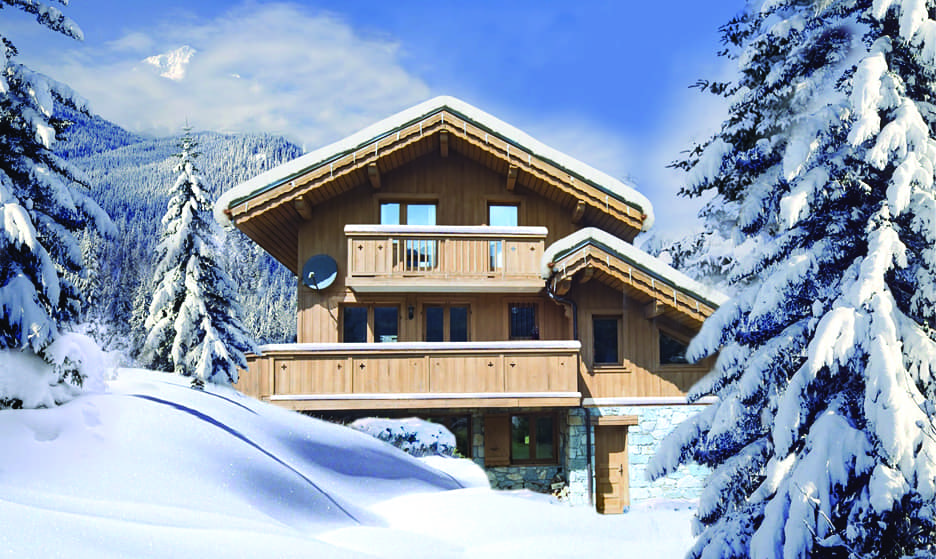 Chalet Bruyère timber chalet surrounded by snowy fir trees
